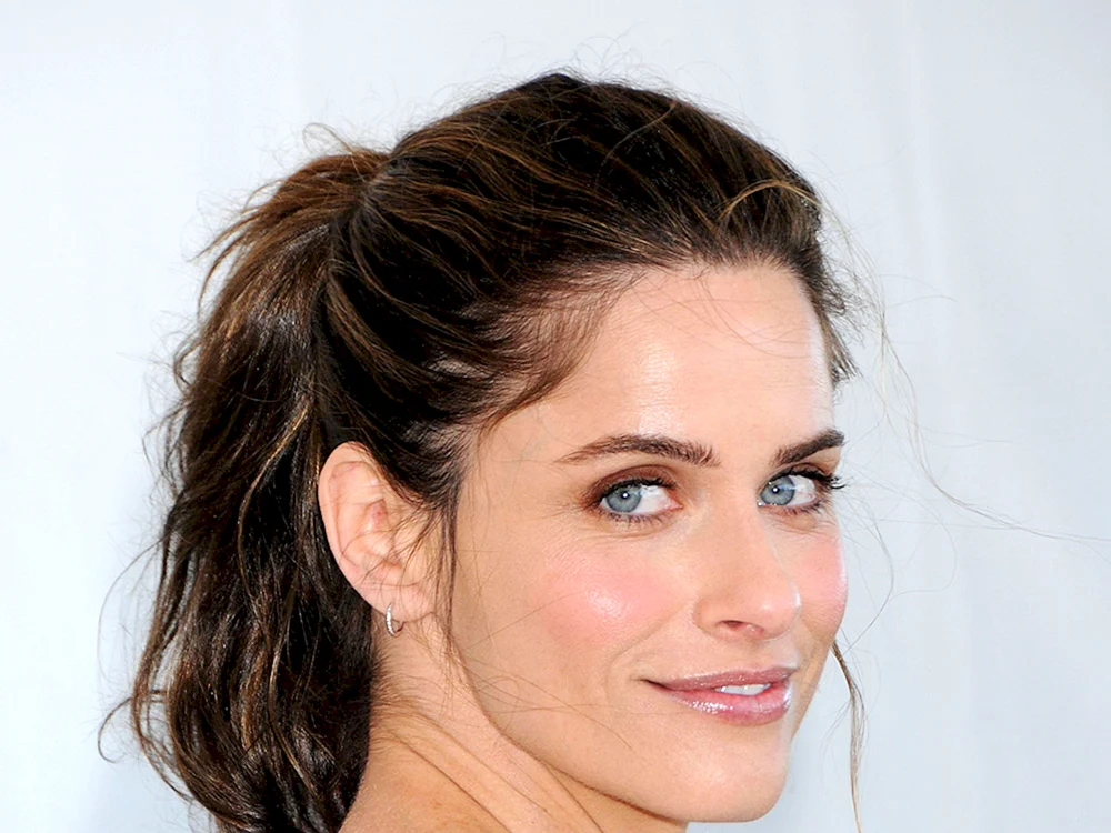 Amanda Peet als junge Frau