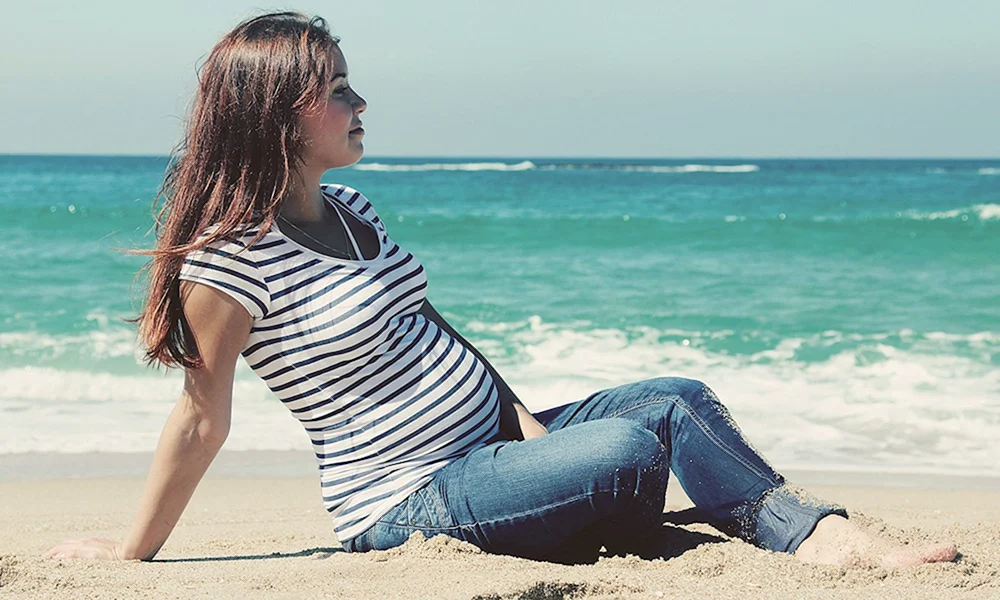 Schwanger am Strand