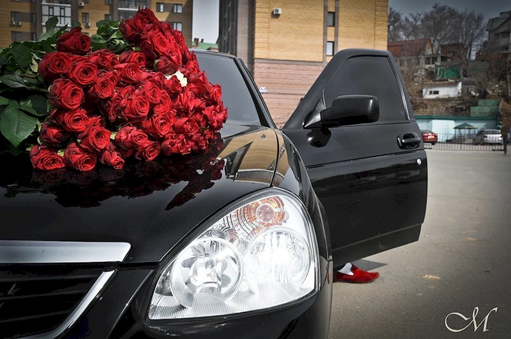 Blumenstrauß im Auto.