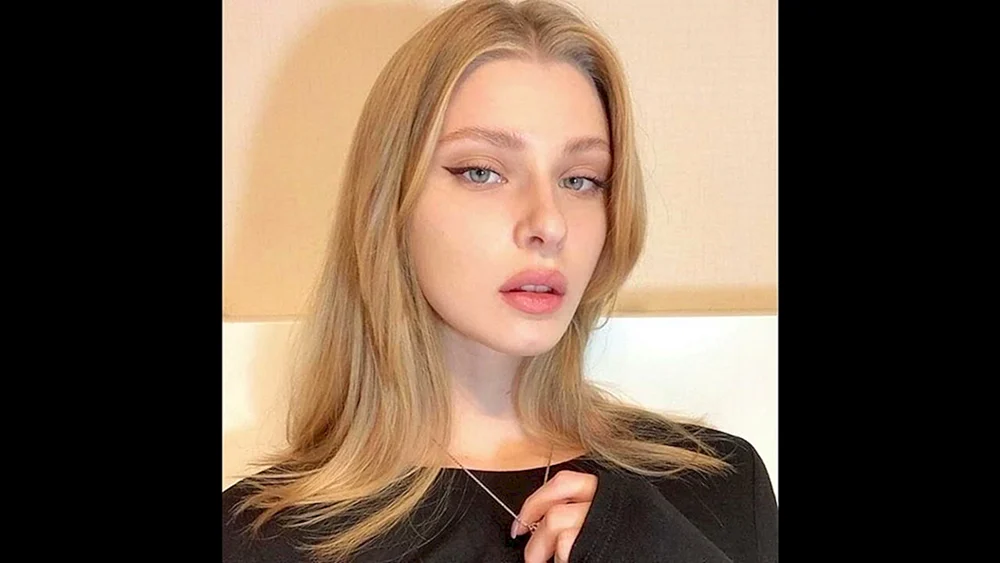 Titova Oksana Evgenievna