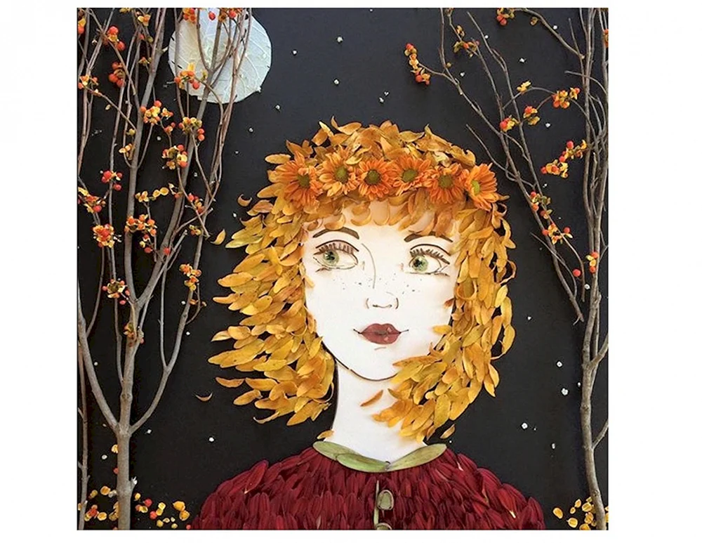 Ein Mädchen beim Herbstbasteln