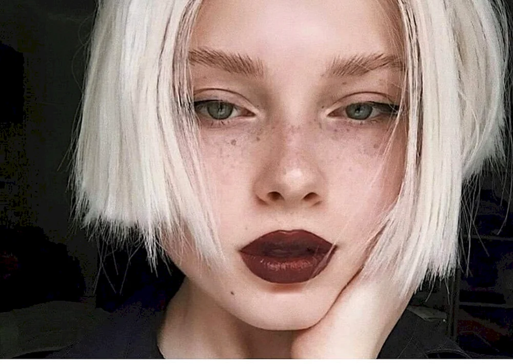 Girl with short white hair