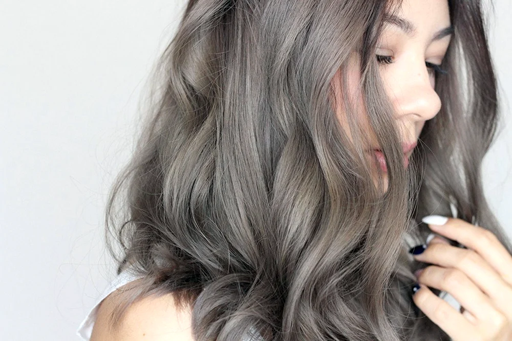 Estel kühle aschbraune Haarfarbe