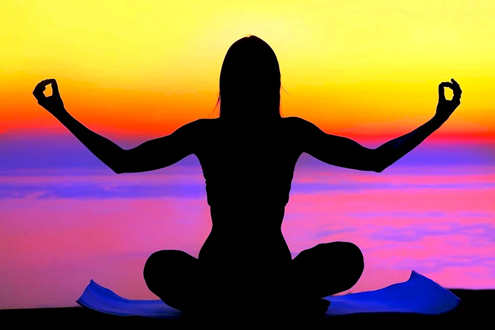 Yoga bei Sonnenuntergang