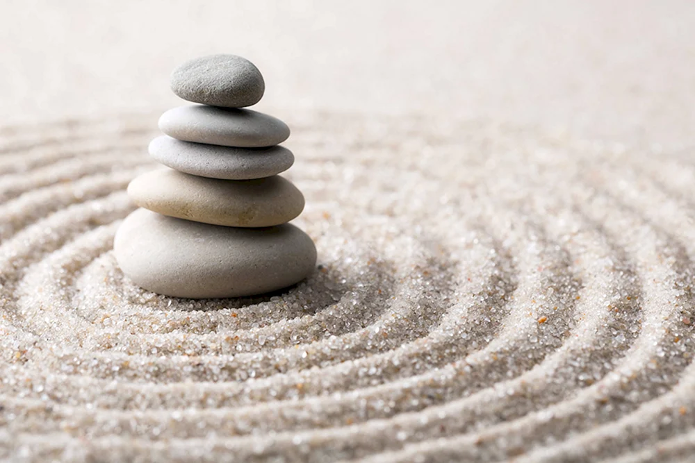 Steine auf Zen-Sand