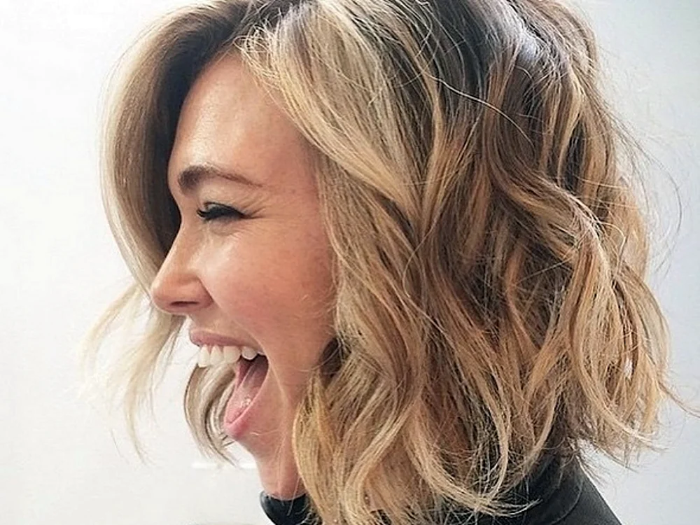 Charlise Theron mit Locken