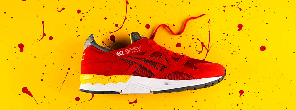 Gelbe Asics Turnschuhe