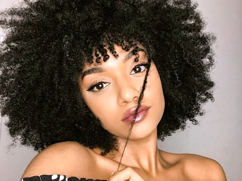 Kat Graham Afro-Locken.