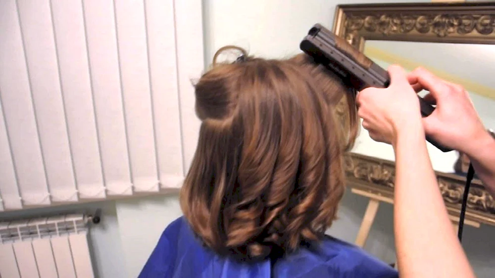 Mittlere Haar Locken mit Eisen