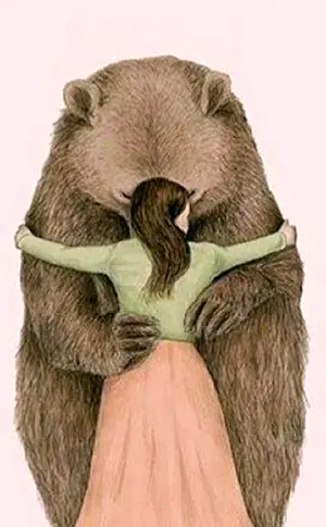 Bär umarmt Mädchen