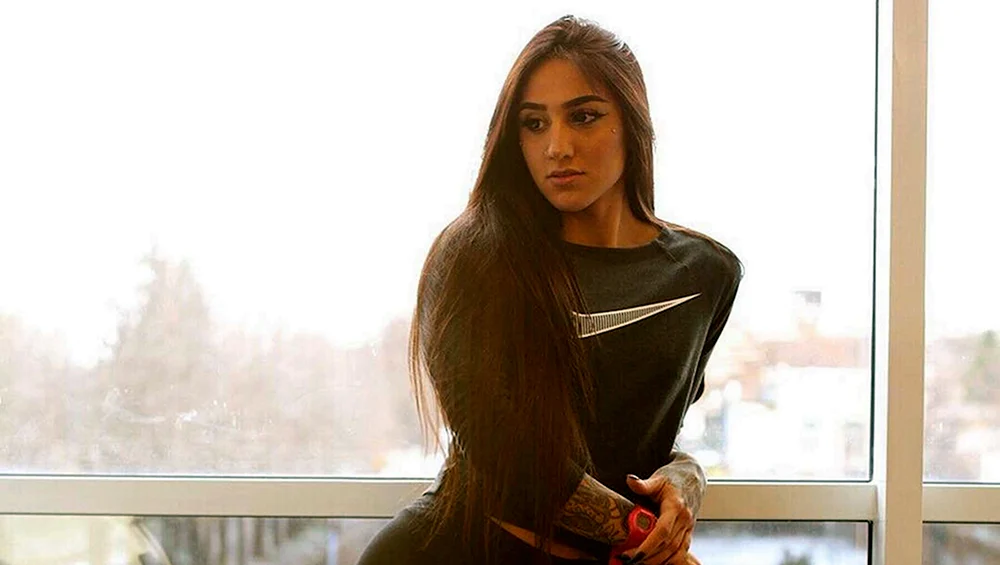 Nabieva Bahar squatting