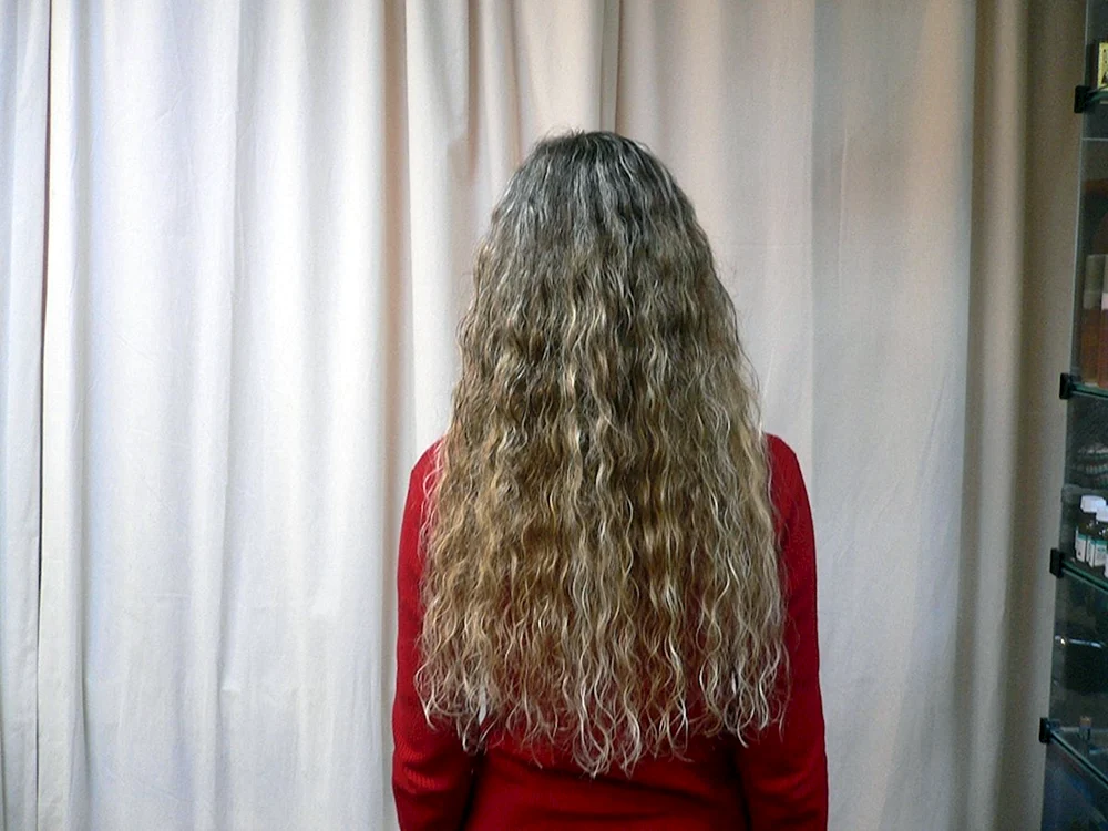 Schwarze gewellte Haarverlängerungen