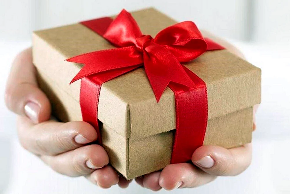 Geschenkbox. Geschenk in der Hand