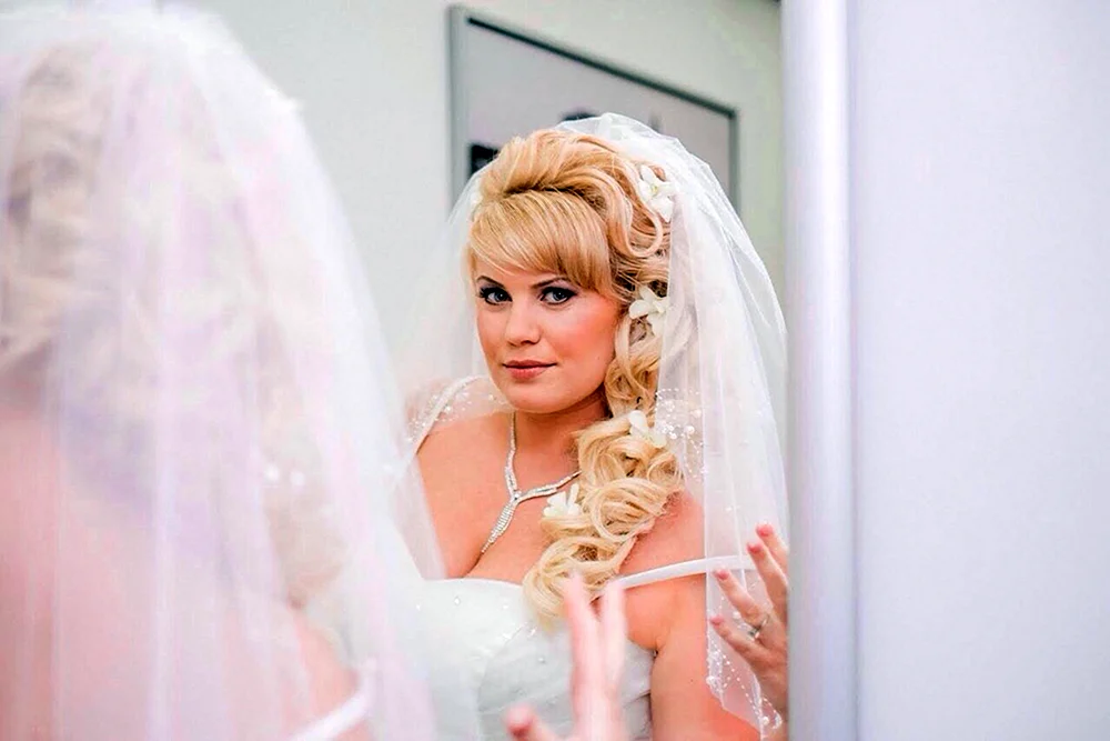 Brautfrisur für Hochzeit in Vesta