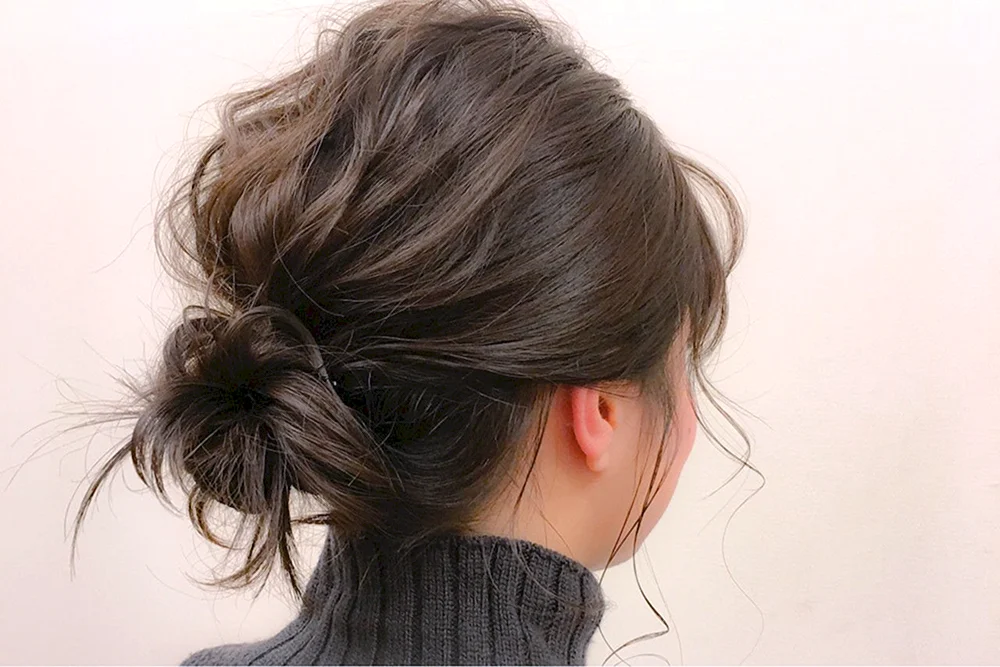 Dutt mit Dutt auf langem Haar