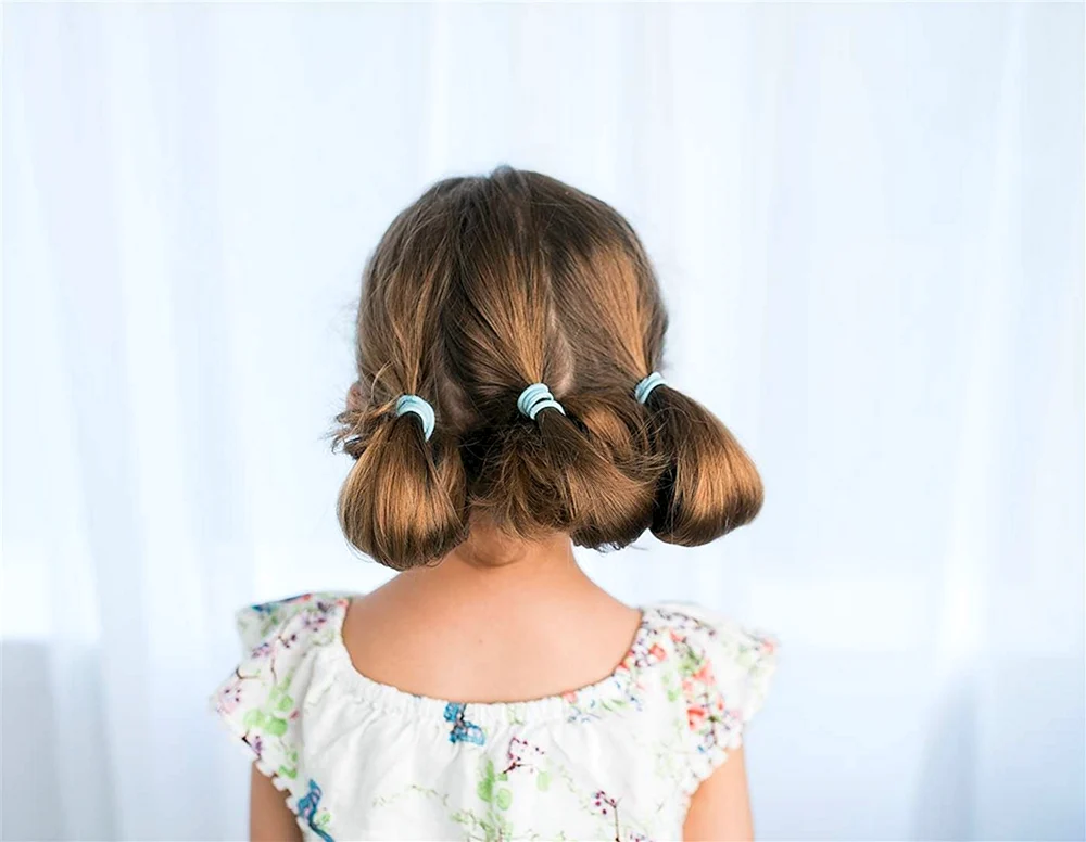 Mädchenduttfrisuren für Mädchen