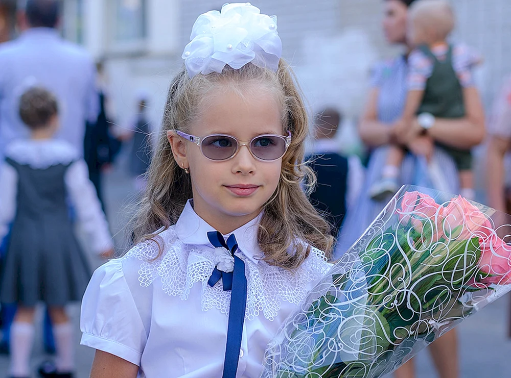 Frisuren für 1. September für Mädchen