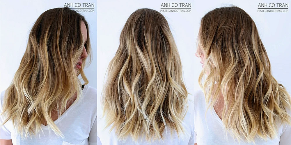 Verbranntes Haar auf dunklem Haar. dunkles Haar
