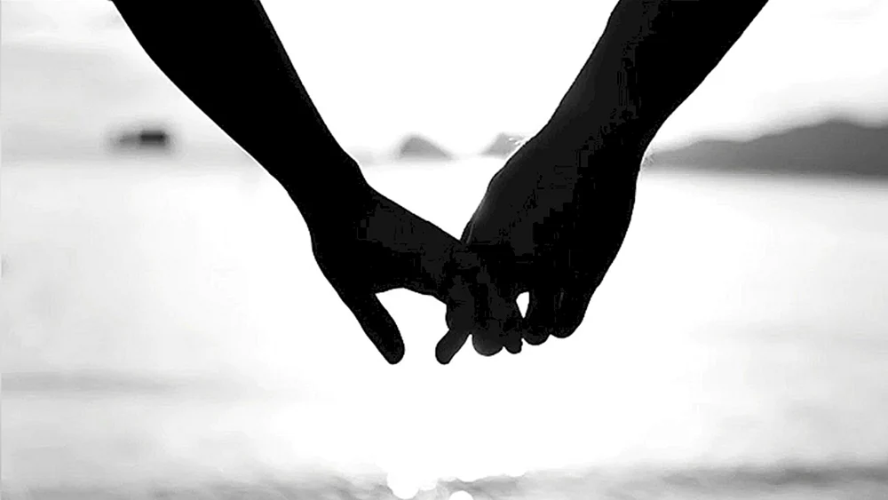 Hände von Verliebten in der Liebe