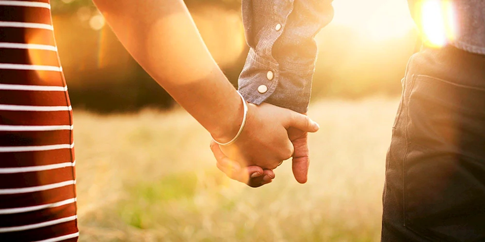 Michaelangelos Erschaffung Adams Hand in der Hand