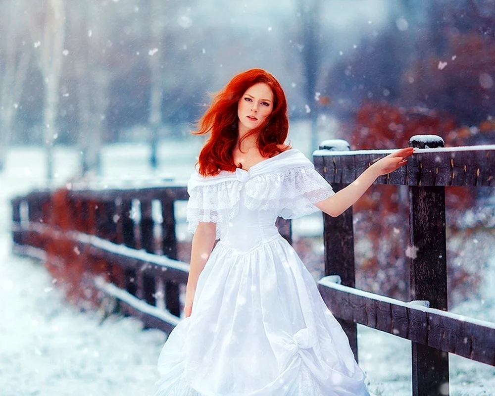 Redheaded girl in white dress
