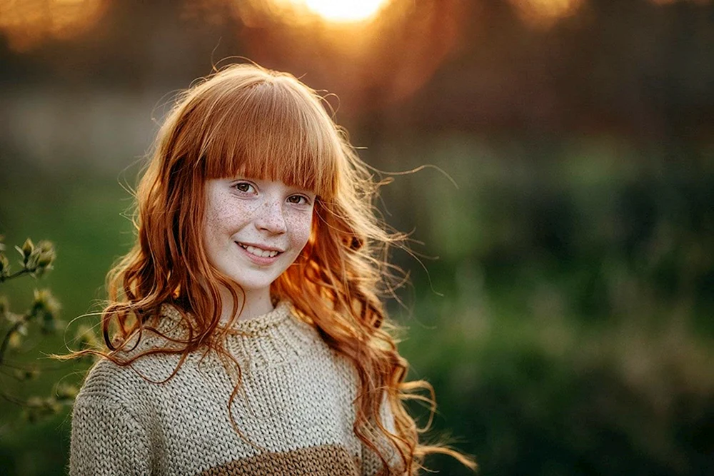 Rotes Haar und Sommersprossen