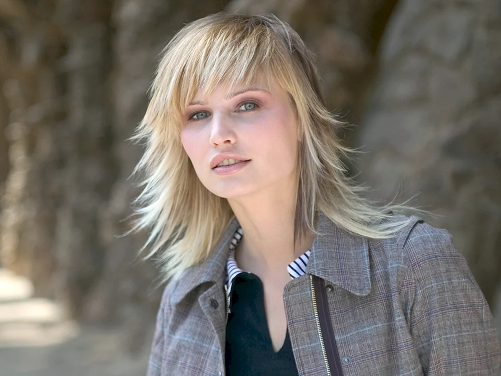 Mittlere Haare Wolf Haarschnitt mit Pony