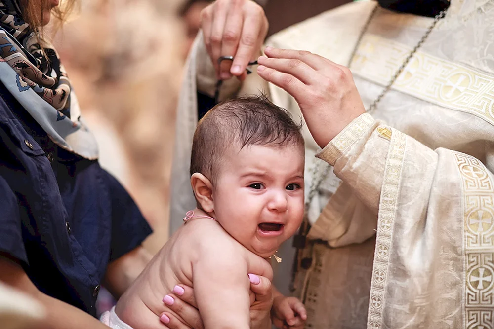 Taufkleid der Taufpatin für die Taufe des Babys