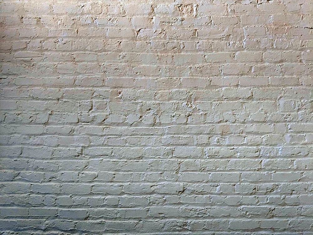Weiße Ziegelsteinmauer