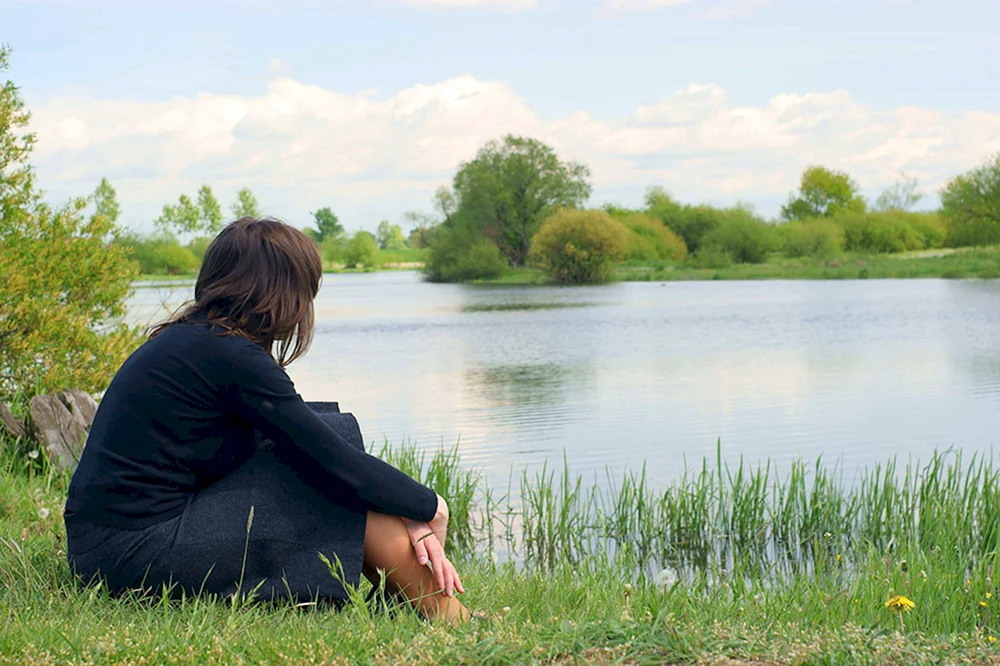 Mädchen am Teich