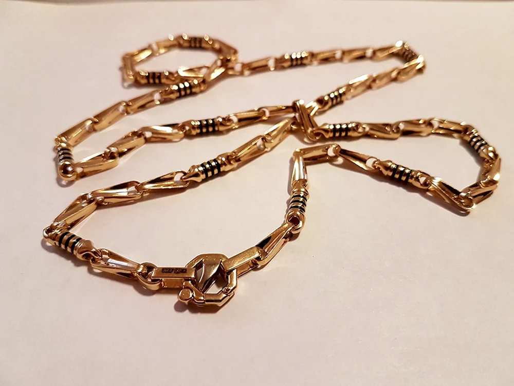 Gold Cartier Flechtkette